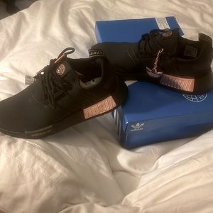 New woman’s rose gold Adidas size 6, originally $150.00. Never worn, wrong size